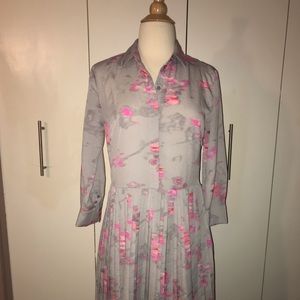 Beautiful pleated grey dress.